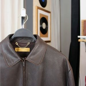 Donna Karan leather brown coat .